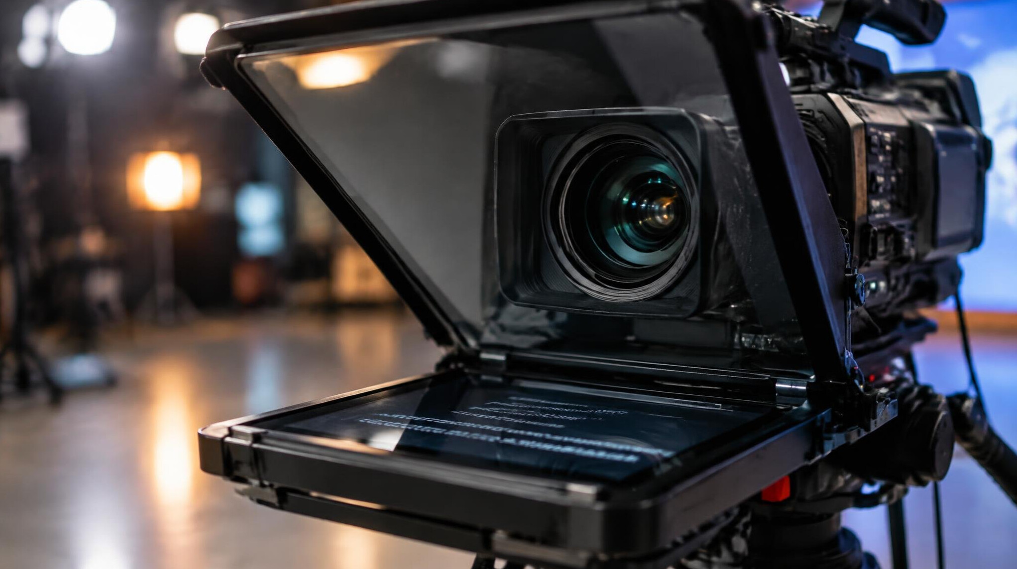 Teleprompter and camera rig close-up on a studio floor